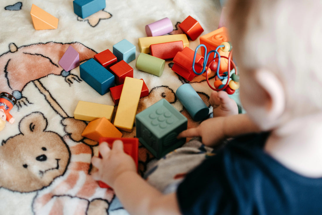 Neurodivergent Child repeating play with some blocks