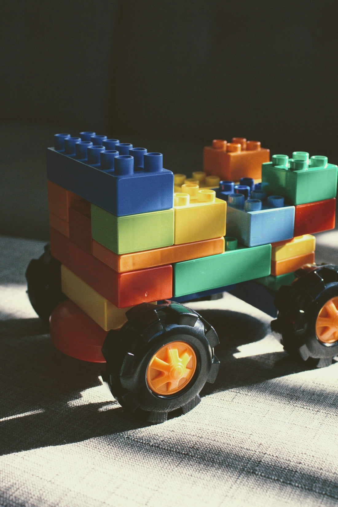 green blue and red plastic toy car