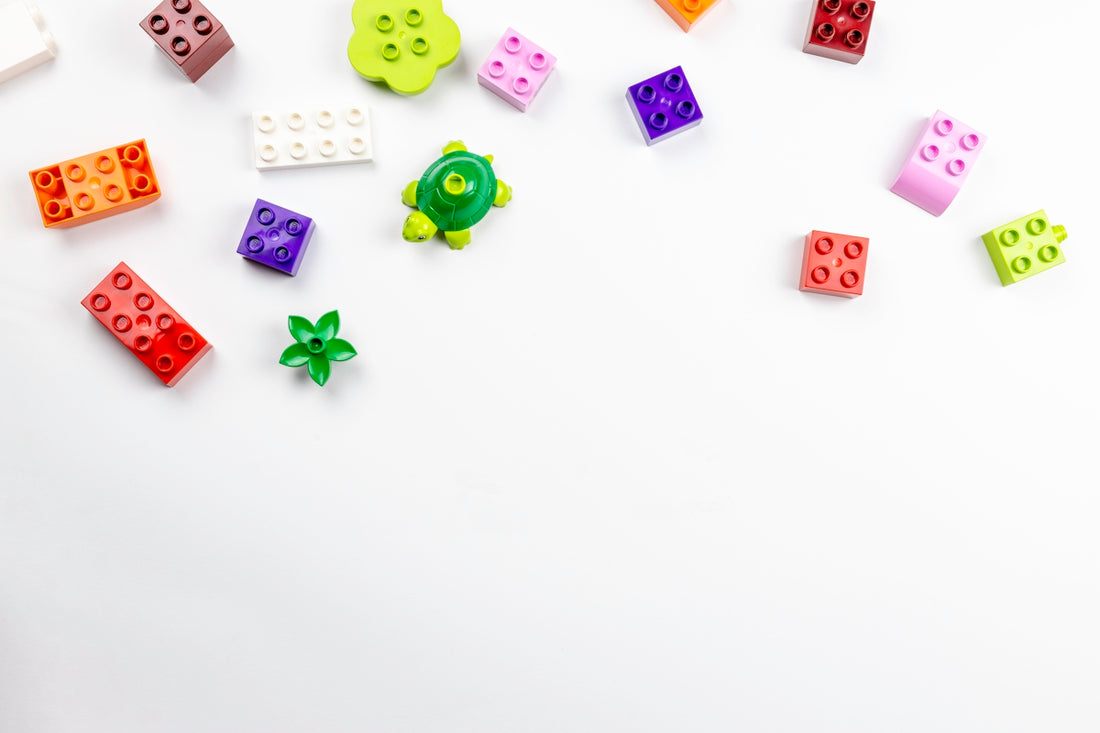 yellow green and pink letter blocks