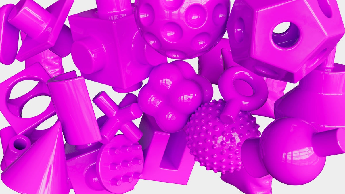 a pile of pink plastic objects sitting on top of each other